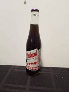 lot 126 image: Vintage Orchard Beverage bottle - part of Coca Cola bottling company