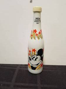 lot 133 image: Vintage 1977 NSDA Convention Anaheim, CA. - Disney bottle with cap