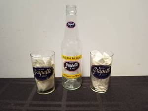 lot 194 image: Selection of Grapette collectibles - bottle and 2 glasses