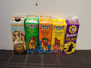 lot 221 image: Selection of 5 milk advertising cartons - Crazy Milk, Land o Lakes, and Borden