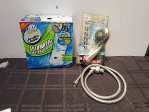 lot 234 image: Shower lot - Shower cleaner and handheld shower head