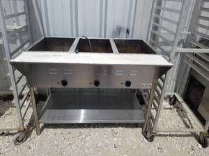 lot 95 image: Stainless Steel heating station with cutting board - heated up when tested - 30 by 43