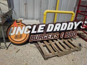 lot 232 image: Sign from Uncle Daddys Burgers and BBQ