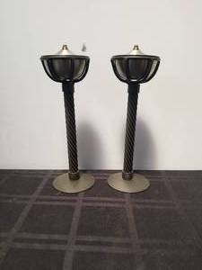 lot 54 image: Pair of oil burning metal candletorches