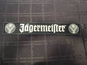 lot 117 image: Jgermeister rubber bardrink mat - 3.5 by 21 - Qty of 2
