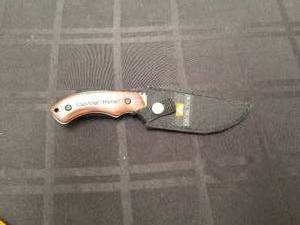 lot 158 image: Ozark Trail hunting knife with sheath