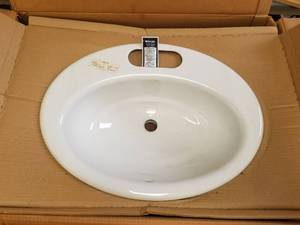 lot 166 image: Kohler cast iron Thoreau Lavatorybathroom sink