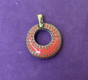 lot 34 image: PREMIER DESIGNS TWO-SIDED PENDANT IN STYLE, DESIGN, AND COLOR(S) SHOWN.