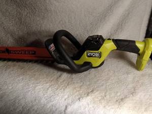 lot 14 image: RYOBI ONE HP BRUSHLESS 18V  HEDGE TRIMMER CORDLESS