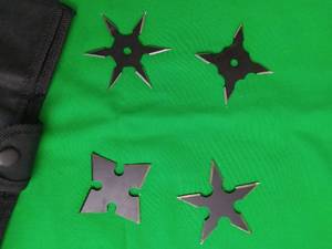lot 38 image: 4 THROWING STARS VERY SHARP