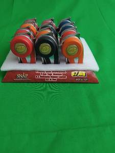 lot 26 image: 12 MULTITOOL TORCH LIGHTERS WITH COUNTER TOP DISPLAY