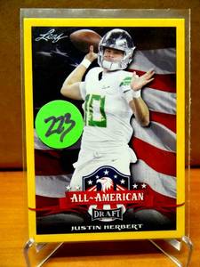 lot 273 image: HOT ROOKIE Justin Herbert 2020 Leaf Draft All-American Yellow Parallel Rookie #63 Chargers