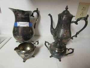 lot 10 image: William Rogers 817 tea pot silver-plate, Wm. Rogers 800 coffee pot silver-plate. Wm. Rogers creamer & sugar silver-plate