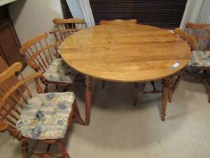 lot 20 image: Blonde wood oval dining table with 2 leaves and 6 chairs. Table 48   each leaf 15 ( SO TABLE CAN BE 78 L )