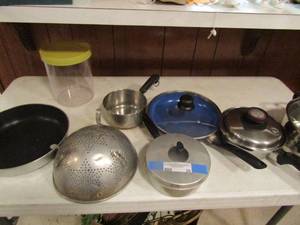 lot 26 image: Lot- pots and pans and strainer