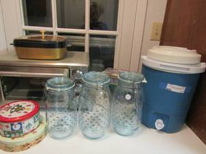lot 37 image: Rubbermaid water pitcher, Tin Cans, coffee pot, Warner casserole and Oster convection oven