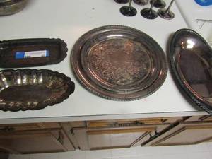 lot 40 image: 6 Wm. Rogers stainless steel serving  platters 6x6 thru 12