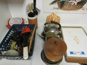 lot 42 image: Pot holders, tea kettle, covered wooden bowl, and misc. kitchen utensils