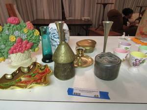 lot 48 image: Lot- 8 blue bud vase, brass candlesticks, 4 fruit goblets and more