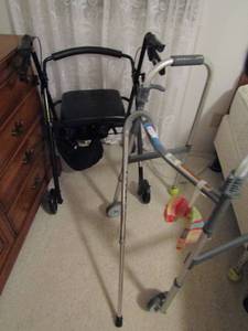 lot 61 image: McKesson 4 wheel fold up walker with seat and storage and Kane fold up 2 wheel walker