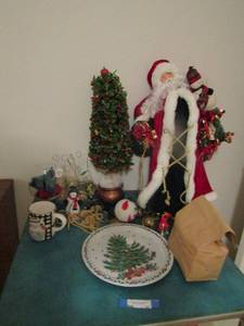 lot 65 image: Christmas lot- 2tall santa with gifts, lighted bush, wrapping supplies