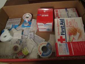 lot 91 image: First aid lot- bandages, gauge, tape and more