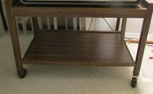 lot 73 image: VINTAGE ROLLING  TELEVISION STAND