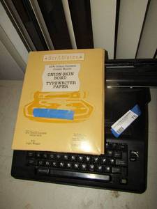 lot 75 image: Sears typewriter  in case & Box of typing paper