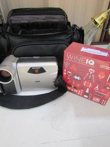 lot 98 image: Wire IQ game NIB sharp VL-AH130 LCD Camcorder with case