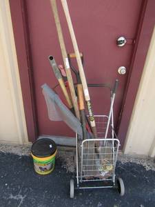 lot 103 image: Bucket of water stop cement (opened) rolling basket of shovels and pics