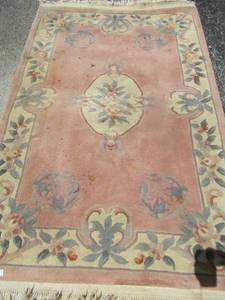 lot 124 image: 100 percent hand woven oriental rug and 6x4 pink floral area rug(needs cleaning