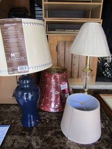 lot 125 image: Gold and clear glass lamp with shade New blue lamp with shade and assorted other shades