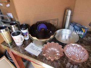 lot 132 image: Cake pans, copper jello molds, travel mugs and NEW christmas lights