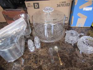lot 138 image: Glass cake cover, sugar creamer, S&P set, footed candle holder