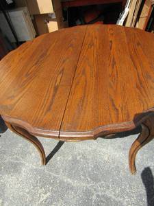 lot 139 image: Brown wood dining table 30x42x42
