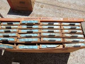 lot 344 image: Box W trays  of carburetor gaskets numbers included are 60121 thru 60279 and in between