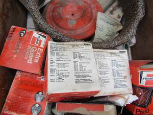 lot 667 image: fram oil filters, distributor caps