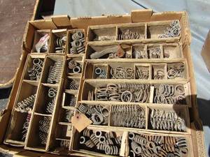 lot 767 image: box of springs for pistons and push rods