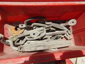 lot 777 image: door cabinet handles in red tub