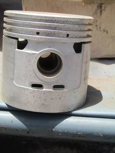 lot 818 image: box of 4 pistons for a ford truck