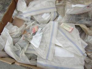 lot 864 image: multi bags of used trailer bearings