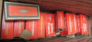 lot 61 image: Box of Standard ignition parts, Part #s go from 108 thru 117 all AL-