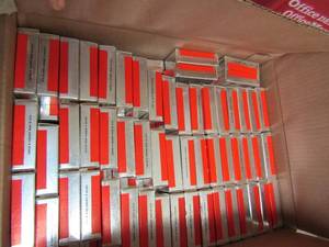 lot 74 image: Box of Caron & contents Made in USA points qty 160