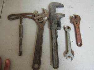 lot 97 image: 2 pair of cressent wrenches and 1 pipe wrench