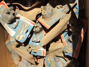 lot 199 image: box CONSISTS OF  Mazda parts 69-72, 1972 distributor caps and points qty 20 plus new