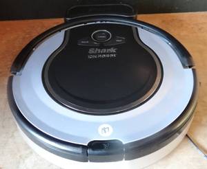lot 187 image: Shark (RV700) ION ROBOT Self-cleaning Vacuum with Smart Sensor