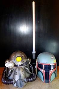 lot 244 image: BIG $ ITEM - STAR WARS COLLECTION - LUCAS FILMS LIGHT SABER AND 2 HELMETS