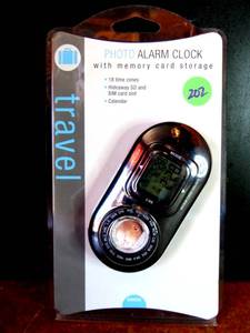 lot 202 image: TRAVEL PHOTO ALARM CLOCK - NEW IN PACKAGE