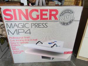lot 25 image: Singer Magic Press MP4 in original box