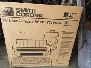 lot 27 image: Smith Corona type writer in original box